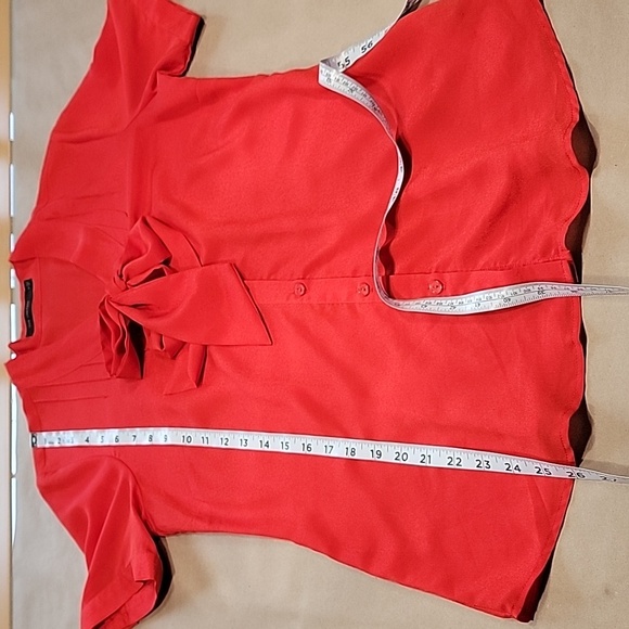 The Limited Size S Red Short Sleeve Button Down Blouse with Tie Neck. - Picture 9 of 12